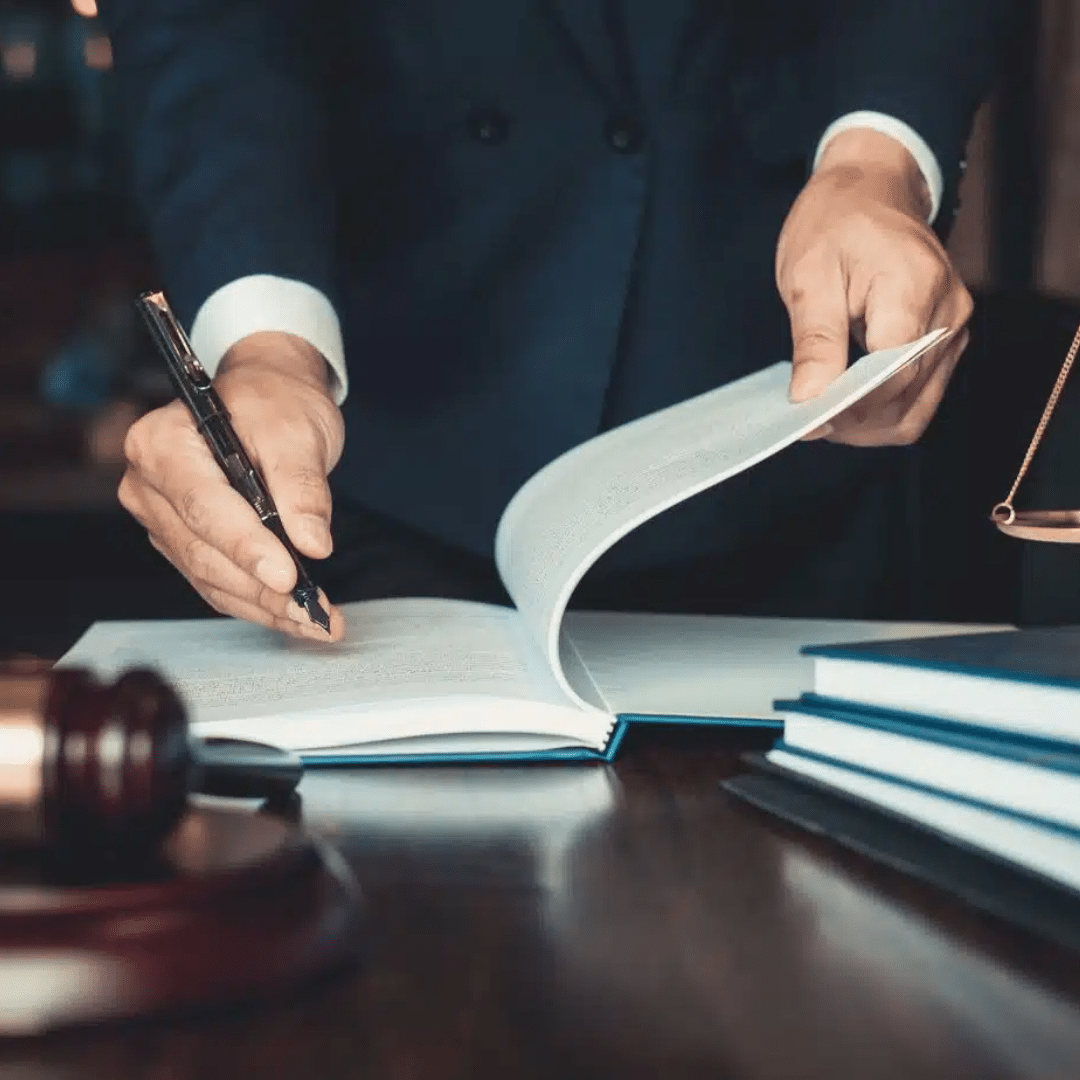 A Lawyer writing on the notepad