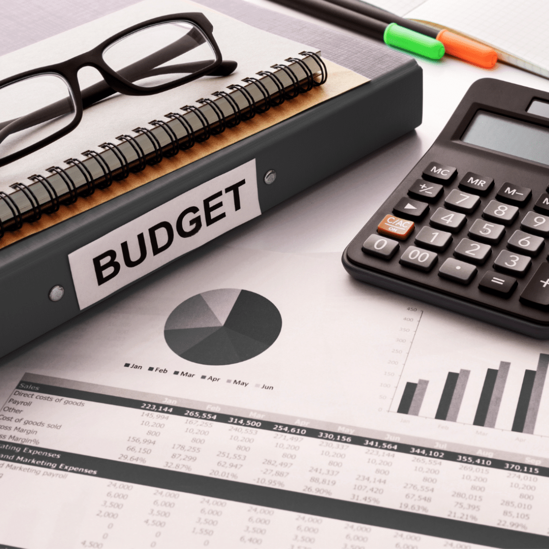 Legal team reviewing outsourcing strategy for 2026 budget